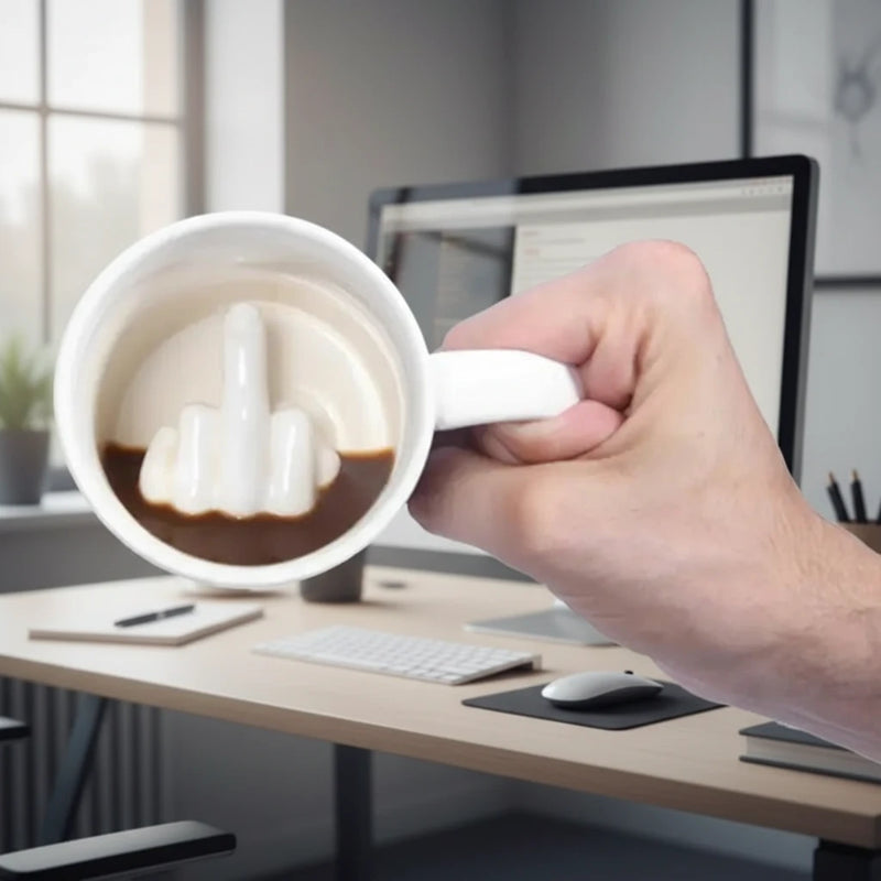 Hand holding a mug with a mild finger inside