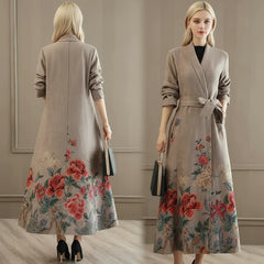 Woman wearing a long suede beige trench coat with floral hem and belt, front and back view.