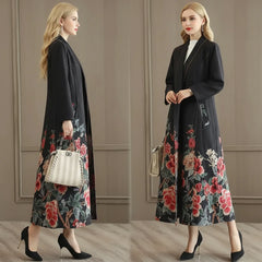 Woman wearing a long black suede trench coat with floral hem and belt, front and back view.