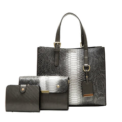 Black and silver snakeskin pattern handbag with matching wallet on a white background