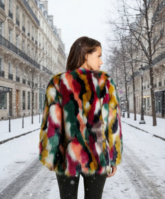 Multicolored fur coat worn by a person on Paris streets