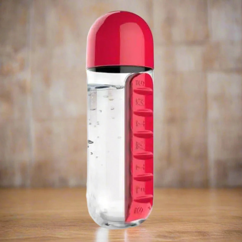 Clear water bottle with red cap and labeled compartments on a white background