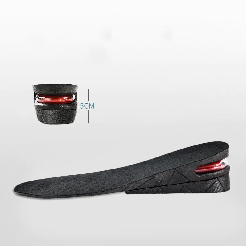 Black shoe insole with red lining on a light gray background