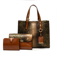 Brown and gold snakeskin pattern handbag and wallet on a white background